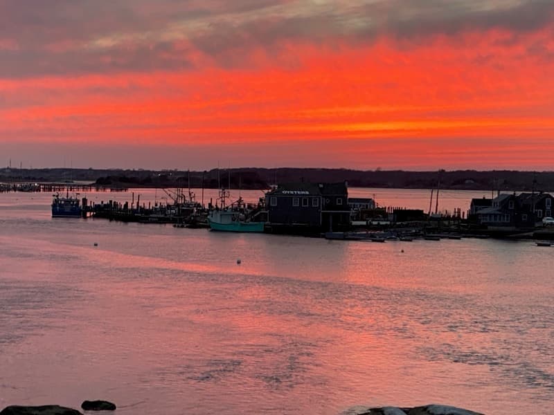 Sunset over the harbor at Westport Point on the South Coast